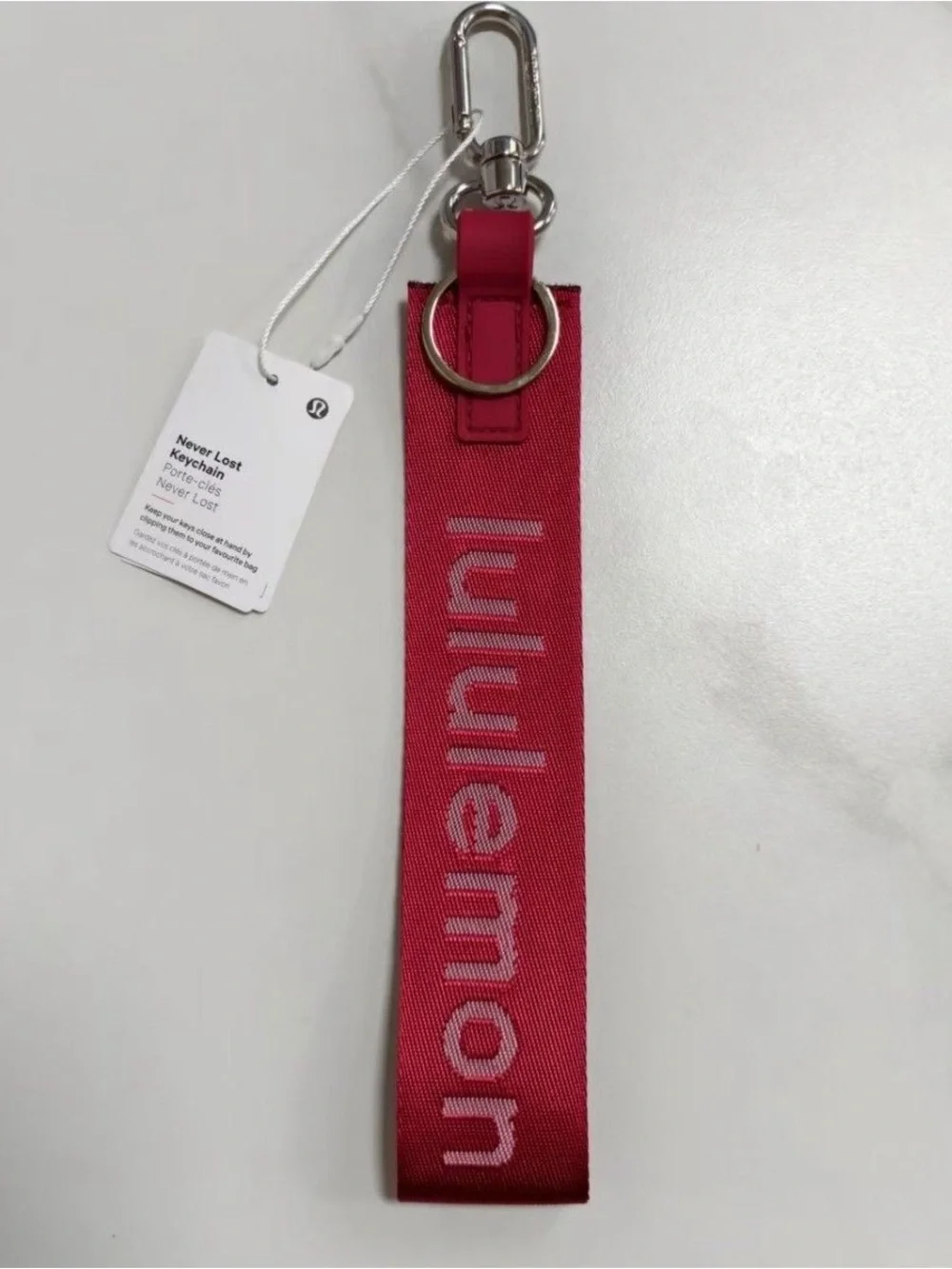 lululemon athletica pink/red Never Lost wristlet keychain with metal clip